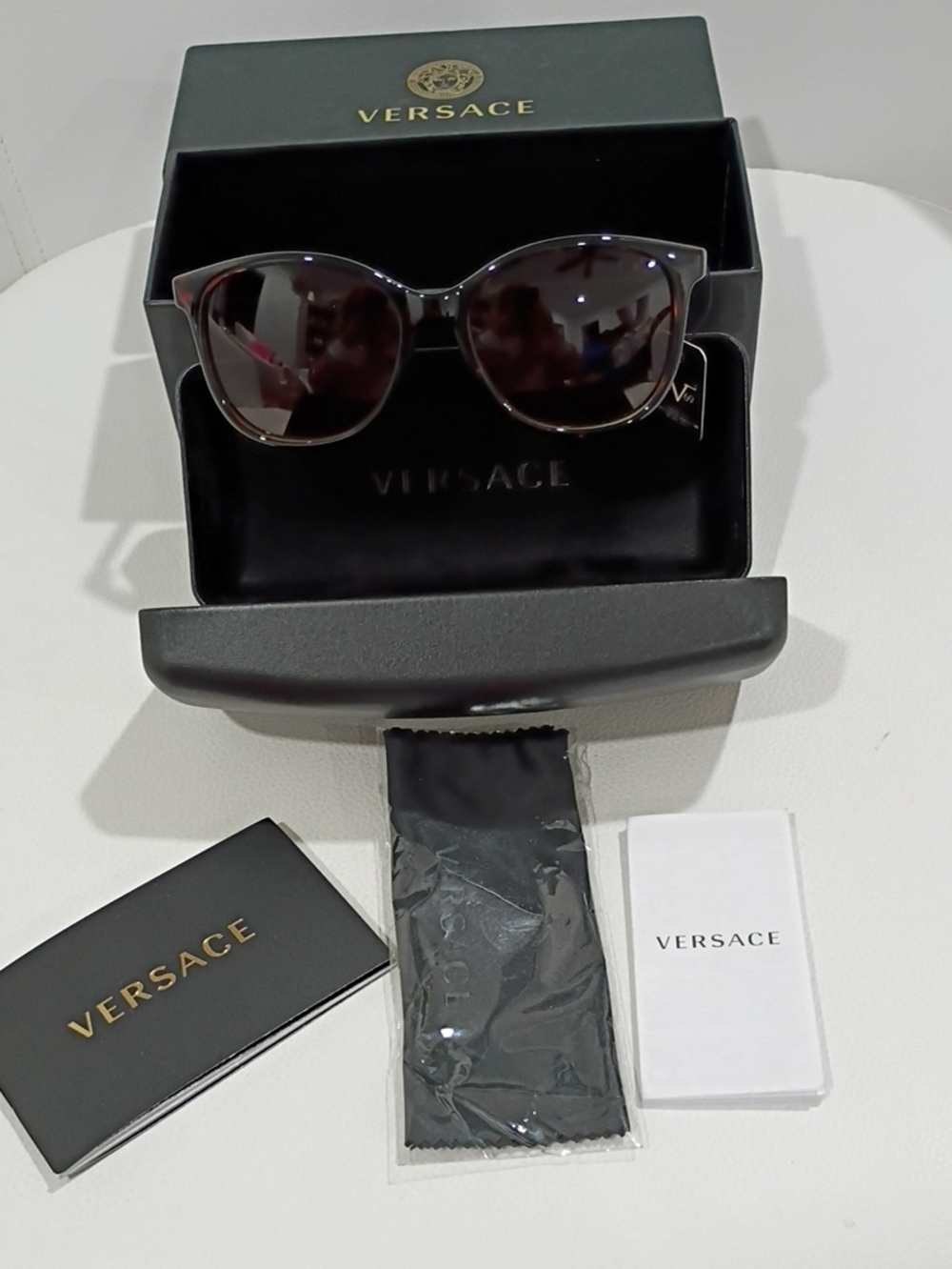 Versace Women's Black and Tortoiseshell Sunglasses with Dark Lenses
